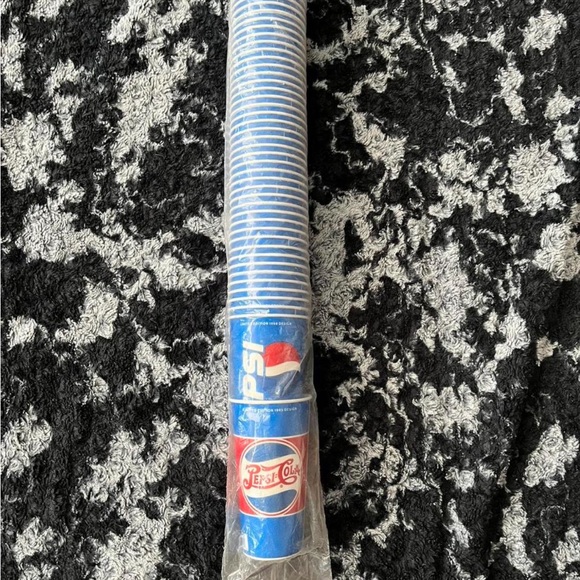 Vintage 1945 & 1998 unopened pepsi paper cups.
